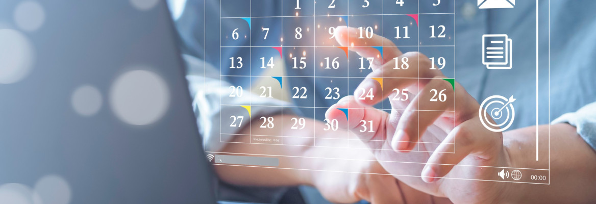 Calendar Diary in Front of the Laptop